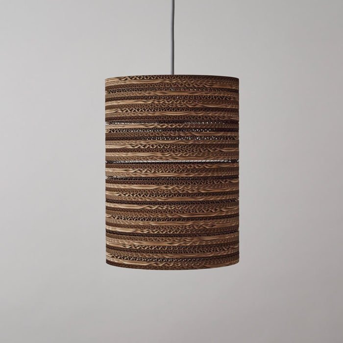 CartOn C2 sustainable lighting - corrugated cardboard, long cylinder pendant, table or floor lamp. Handmade in the UK from 100% cardboard, from FSC certified forests and 85% recycled material. The deep cylinder makes this perfect as a pendant, table or floor fitting. If you're eco aware, this sustainable lighting choice ticks all the boxes. It creates a superb glowing pattern when lit. Non toxic, biodegradable glue and local materials. Max 100w incandescent. Compatible with CSL and LED lamps the same wattage. See all shapes and sizes of cardboard lighting at www.chalkandmoss.com/brand/tabithabargh.