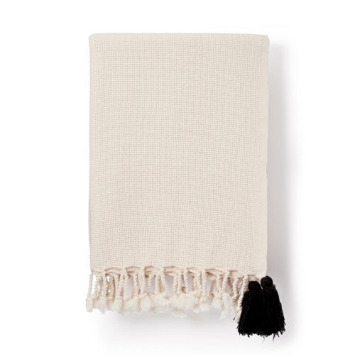 Organic cotton blanket, cream with a delightful black pom pom. Drapes soft and beautifully as a bedspread or sofa throw. 135 x 180cm . .. . . #organiccotton #wellnessblanket#wellness #wellbeing #blanket #blanketsandthrows #cosy #cosyvibes #hygge