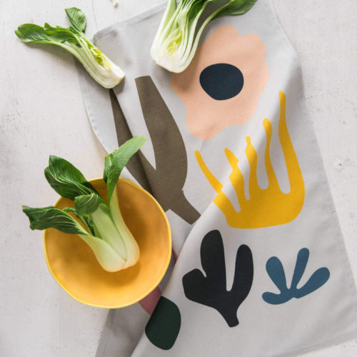 Leaf towel is beautiful, absorbent, soft and colourful. Featuring an abstract custom design inspired by Scandinavian aesthetics and shapes from nature. This little kitchen towel makes a perfect gift for any occasion or to add some sparkle and contemporary feel to your kitchen. The design has a real Matisse flavour. Softer + Wild kitchen tea towels are made from 100% cotton and are hemmed on 4 sides. All fabric patterns are bespoke, original designs created for the specific product by Softer + Wild in their lovely studio in Lewes, UK. They care about the environment, so their products come in a fully recyclable natural card box. Hanging loop 49cm x 70cm 100% cotton Wash at 40 degrees Made in Great Britain