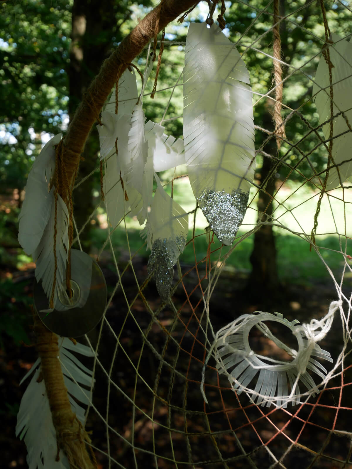 Make your own dream catcher in the woods at Into The Trees family festival. Pippingford Park, Ashdown Forest, Sussex.