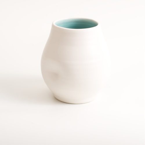 Handmade dimpled ceramic vase, hand thrown by Linda Bloomfield in London. Available with turquoise or pale blue inside. A great gift, paired with the Linda Bloomfield dimpled jug and cup.