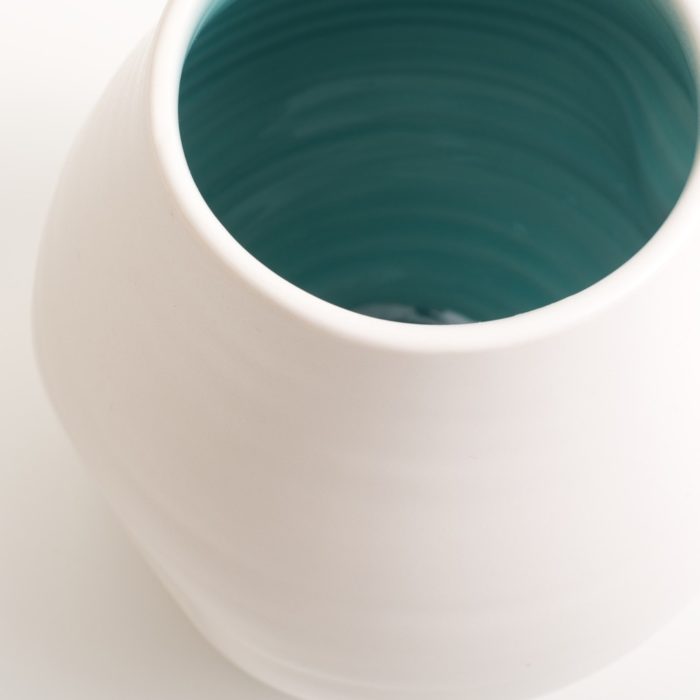 Handmade dimpled porcelain vase turquoise, hand thrown by Linda Bloomfield in London. Also available with pale blue inside. A great gift, paired with the Linda Bloomfield dimpled jug and cup.