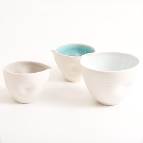 handmade pottery bowl with tactile dimples. Small or medium size. Inside glazed in a choice of: pale blue, turquoise, pink or grey.