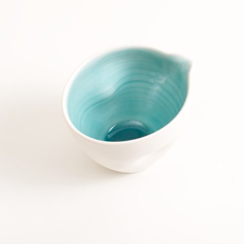 Handmade porcelain pouring bowl small turquoise with tactile dimples. Small or medium size. Inside glazed in a choice of: pale blue, turquoise, pink or grey.