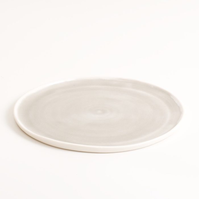 Small grey handmade porcelain plate. Made in 3 sizes 5 colours. Hand thrown in England, dishwasher safe. These look great as part of a mix and match set. For every day dining and entertaining.