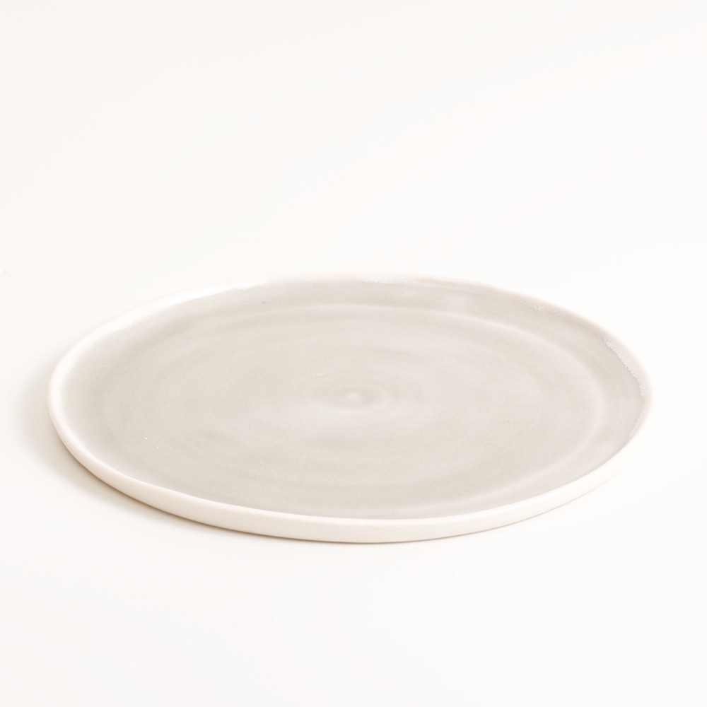 Small grey handmade porcelain plate HPLATE-SG-1 Small grey handmade porcelain plate. Made in 3 sizes 5 colours. Hand thrown in England, dishwasher safe. These look great as part of a mix and match set. For every day dining and entertaining.