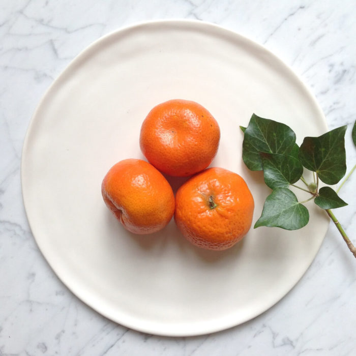 Handmade Porcelain Matt White Plate tangerine by Linda Bloomfield on Chalk & Moss