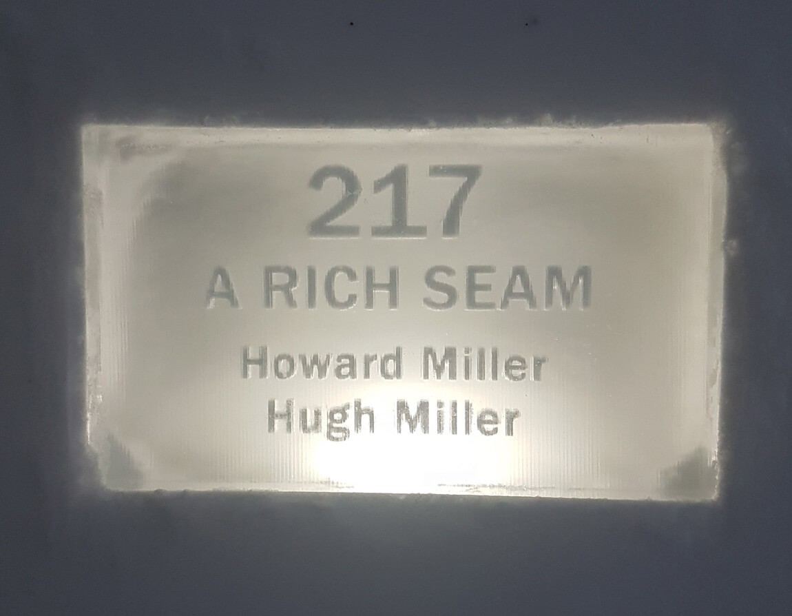 The sign for Hugh and Howard Miller's room at the ICEHOTEL 2018: A Rich Seam. This theme is based on digging through snow and ice for a seam, and then continuing digging further for more discovery.