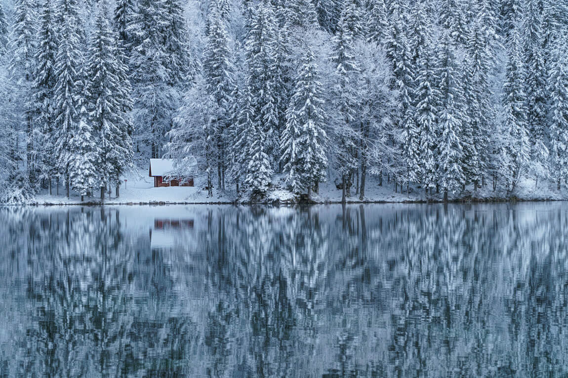 A cabin in the woods. Peace and tranquility in extreme weather excites and calms the soul. Image by Mauro Zamarian on Unsplash.com.