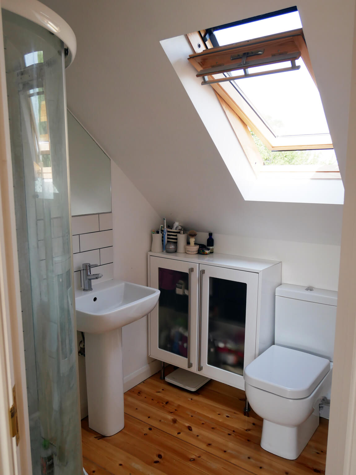 Even the bathroom gives a pleasurable view over the South Downs! The window is large and shoulder height for accessibility.