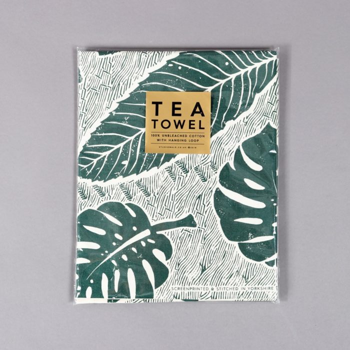 Green tea towel designed with a screen printed large leaf design. This is how it will arrive to you in neat packaging and gold sticker. By Wald on Chalk & Moss (chalkandmoss.com).