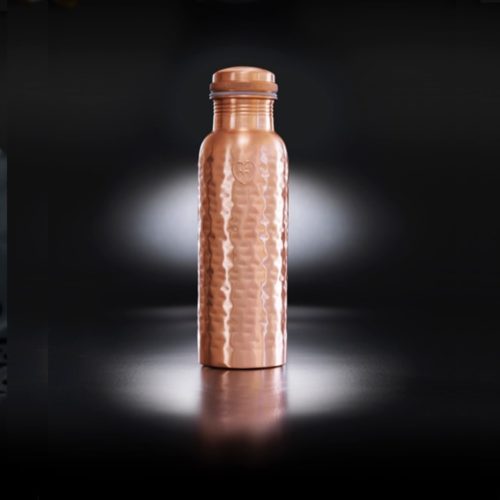 Copper water bottle in hammered matte copper. The ion charged water from this bottle can help ease digestive ailments and sore joints, protect you from sun damage and keep your skin youthful by helping cells regenerate, and much more! This is the Athlete model with a wide mouth and 850ml capacity.