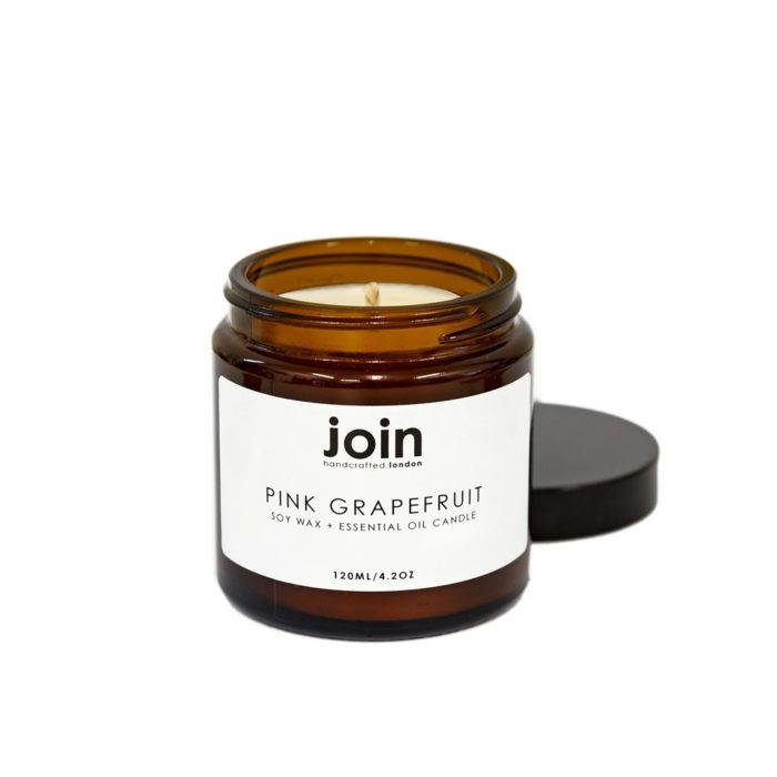 Pink grapefruit luxury candles, hand crafted in London with 100% vegan soy wax and high quality essential oil. The pink grapefruit scented candle is your happy all rounder - this zingy essential oil is often used to treat depression, so it's uplifting quality will be appreciated in any home or setting. This makes it the perfect gift for your friend who has everything! These aromatherapy candles look and smell beautiful both day and night. Choose from three sizes ranging from 10 hours to 45+. Luxury candles by Join are made from natural, cruelty free ingredients with recycled packaging.