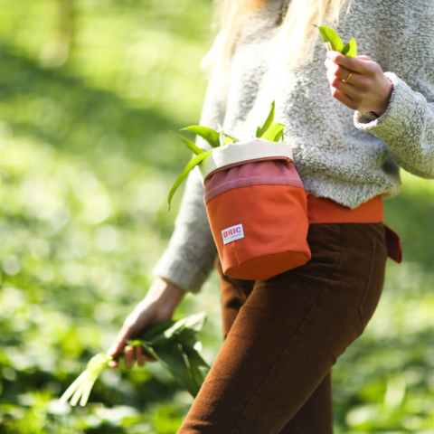 Foraging bag - Bric - orange & pink - lifestyle image wild garlic