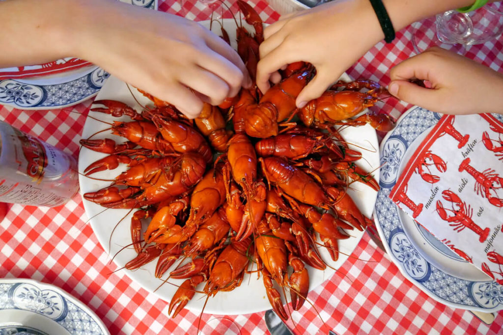 Unless you're vegetarian, no summer holiday in Sweden is complete without partaking in the annual crayfish festival. Silly hats and songs compulsory! (think Christmas crackers but, well, the Swedish way). 