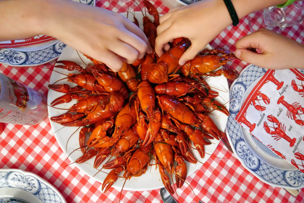 Unless you're vegetarian, no summer holiday in Sweden is complete without partaking in the annual crayfish festival. Silly hats and songs compulsory! (think Christmas crackers but, well, the Swedish way). 