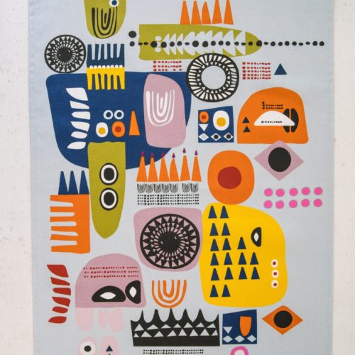 The “Shapes” colourful tea towels are a Scandinavian influenced abstract, bold and contemporary design. The two contemporary tea towel designs have subtle differences, both with playful, colourful combinations of abstract patterns suggesting faces. Design 1 (seen here) has more yellow, while design 2 has more blue. You can match or mix and match these quirky tea towels with oven gloves  in the same design, for a full kitchen set. Features: Hanging loop 50cm x 70cm 100% cotton Wash at 40 degrees Made in Great Britain If you like this quirky design, you might also like to mix and match with the bright and bold "Solstice" tea towels, oven gloves and apron for a full kitchen set. Both designs are strongly influenced by Scandinavian folklore and design. All dyes used by Softer + Wild are water-based and very gentle and reflect a rustic, organic feel to their products – perfect for gifting and bring comfort, luxury and design to the table.