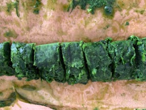 Wild garlic pesto, frozen in a roll. If you take it out mid freeze, you can cut it into sections so you can get them out easier once frozen. Wild garlic is packed full of nutrients!