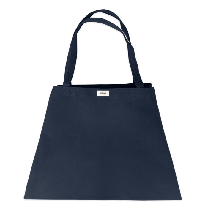 Carry your life around in style with this large overnight bag in organic cotton. This huge bag is practical and unique, perfect as a day bag, or used for going to yoga, the gym. The large size also makes it suitable as a lightweight weekend bag. Available in clay, black, dark blue and stone (seen here in dark blue). Size: 90 X 45 X 35 cm